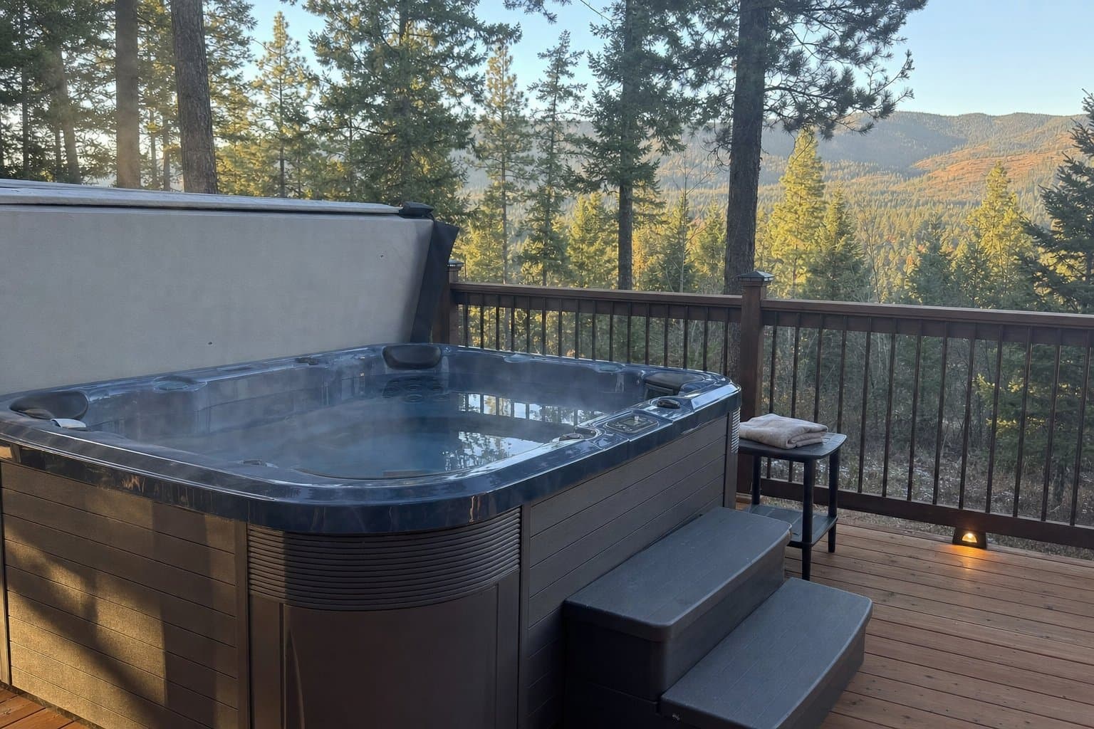 A well-maintained residential hot tub on a deck in the Priest Lake area
